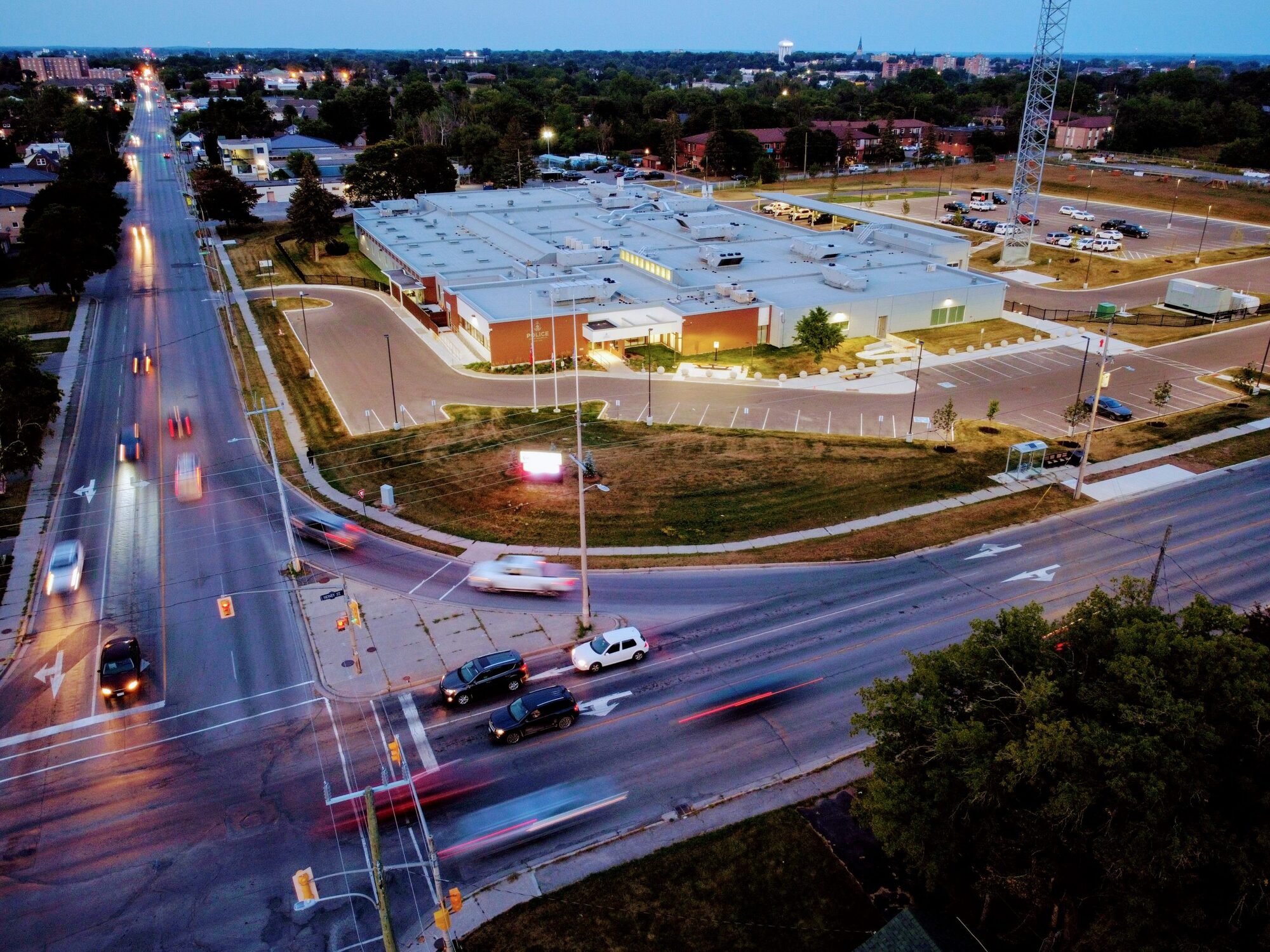 Aerial view of Belleville Police Service headquarters at dusk on Sidney Street