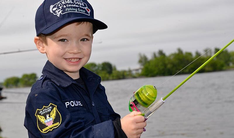 Young participant in the Belleville Police Kids & Cops fishing program